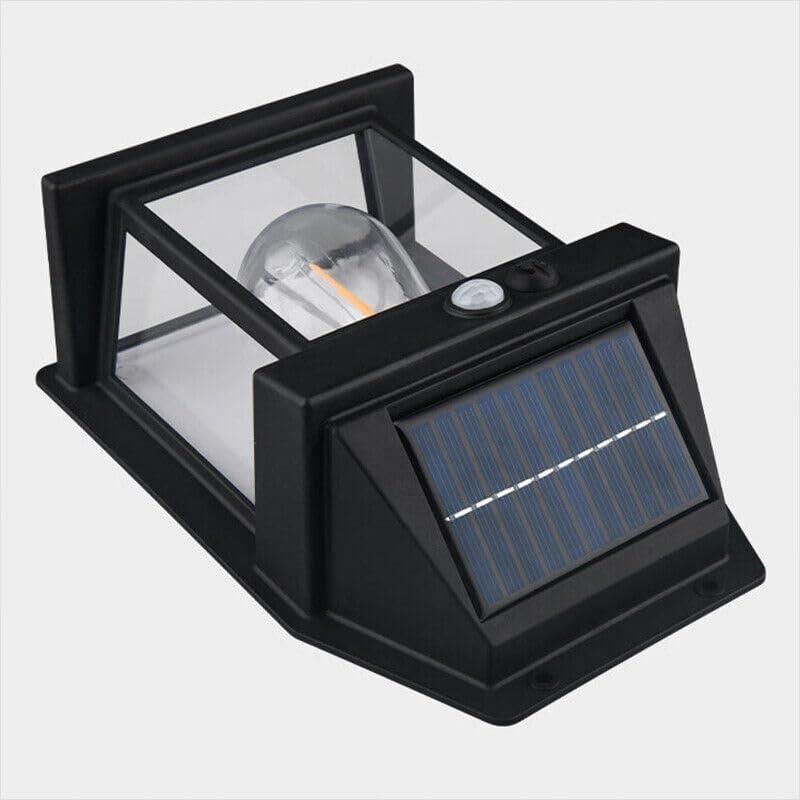 Black solar-powered outdoor light fixture with a solar panel on a white background